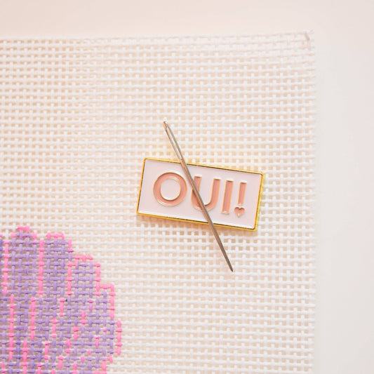 Oui! Needle Minder